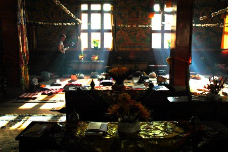 Dharma student studies after the Hevajra empowerment on Bodhisattva day, inside Tharlam Monastery of Tibetan Buddhism, Bodha, Kathmandu, Nepal photo