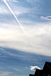 Chemtrail with dark lines.