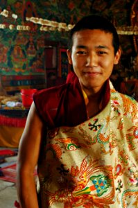 Tibetan Band member in Dragon and Jewels silk, Lam Dre, Bodhisattva Day, Boudhnath, Kathmandu, Nepal