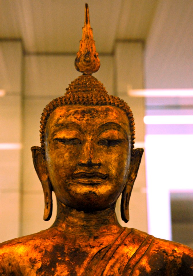 Statue of Lord Buddha, flame of wisdom, bust, Thai or Cambodian, San Francisco airport display, California, USA