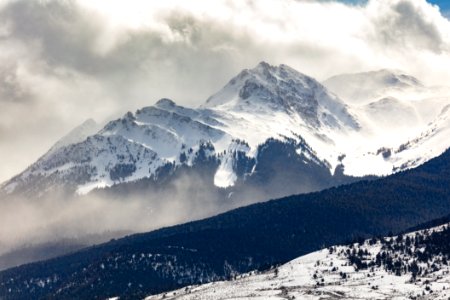 Electric Peak emerges from an afternoon storm photo