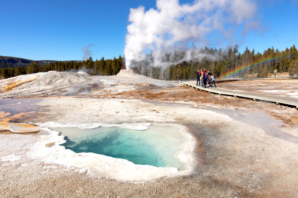 Lion Geyser eruption and rainbow