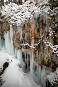 Icicle formations on travertine (portrait) photo