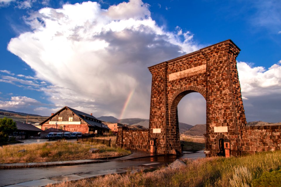 Rainbow between Roosevelt Arch and Yellowstone Forever