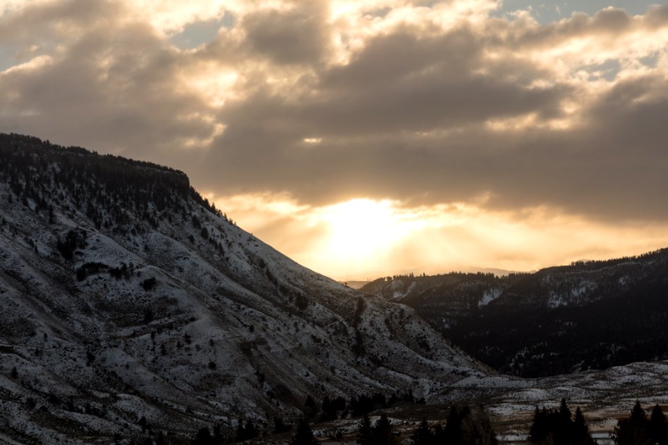 Sunrise through the clouds from Mammoth Hot Springs