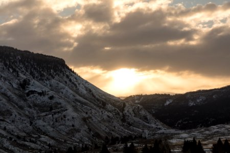 Sunrise through the clouds from Mammoth Hot Springs