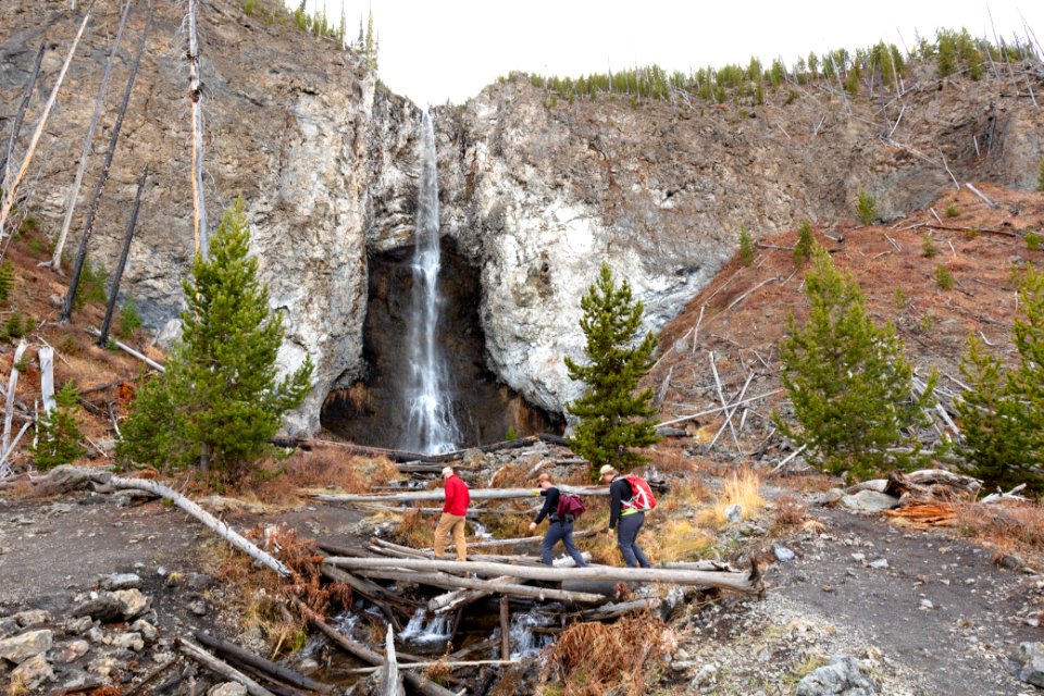 Hikers cross Fairy Creek below Fairy Falls