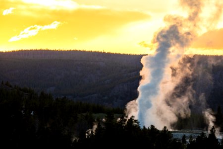 Daisy Geyser eruption at sunset from Grand Geyser platform