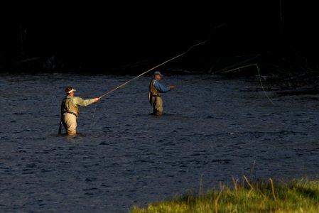 Visitors fishing the Firehole River photo