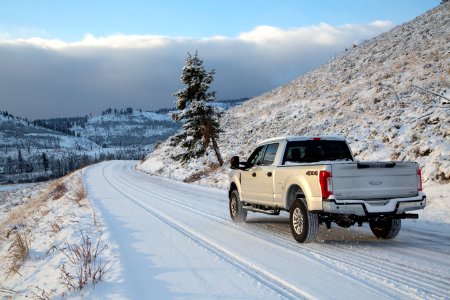 Snow-covered road near Tower Junction photo