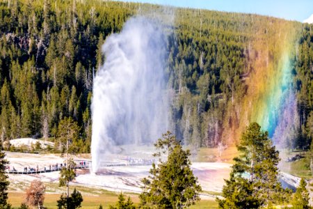 Beehive eruption and rainbow viewed from a distance