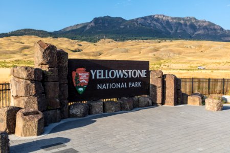 Park Entrance sign and Sepulcher Mountain photo