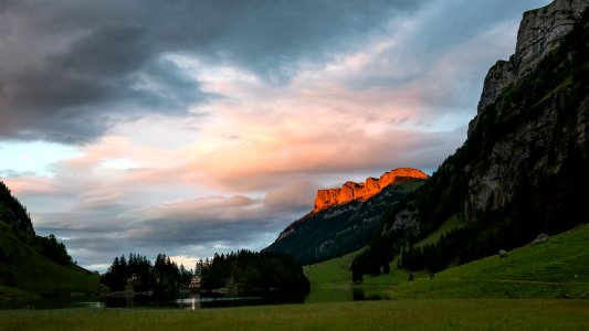 Sunset over Seealpsee lake photo