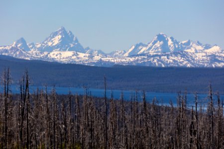 Tetons ride above Yellowstone Lake from East Entrance Road photo