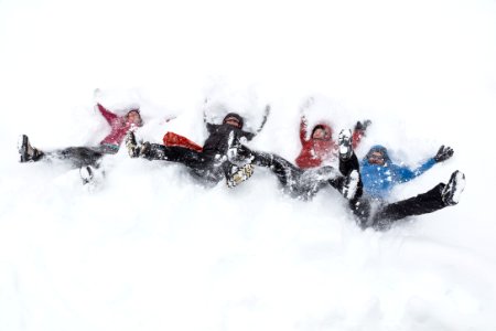 Group making snow angels at Canyon photo