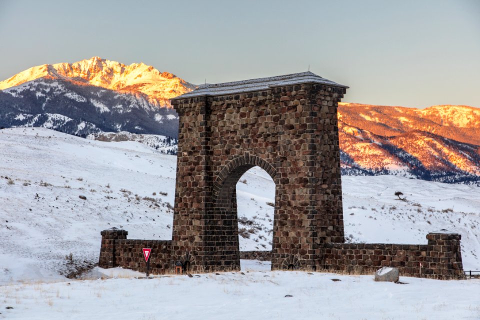 Sunrise at Roosevelt Arch with Electric Peak