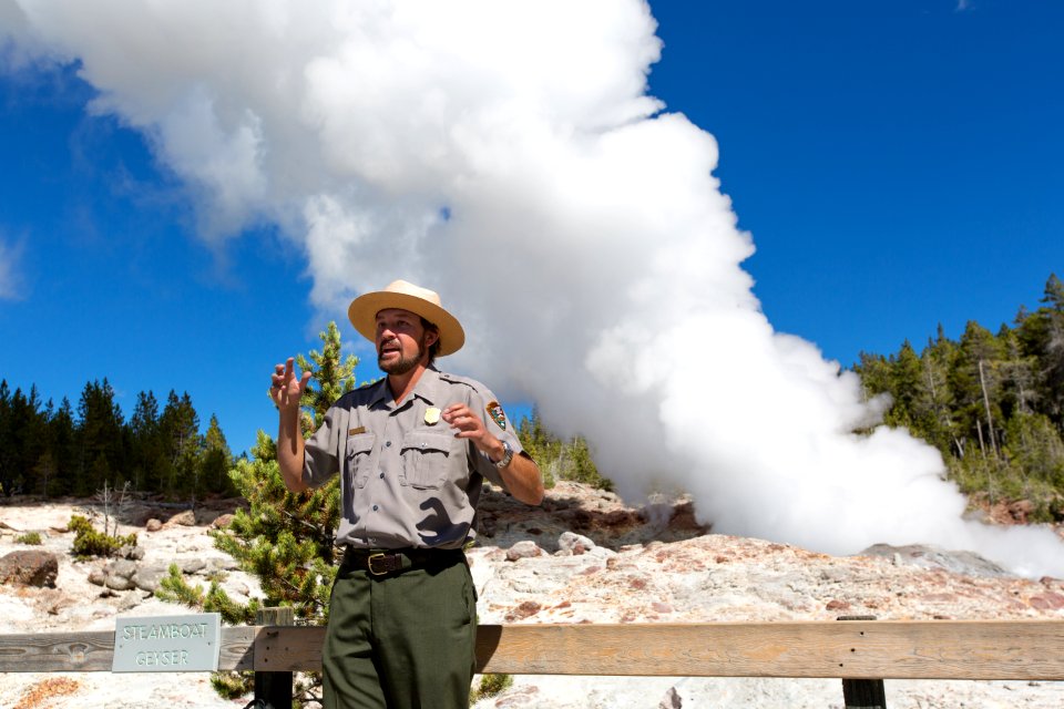 Steam phase of Steamboat Geyser and Park Ranger