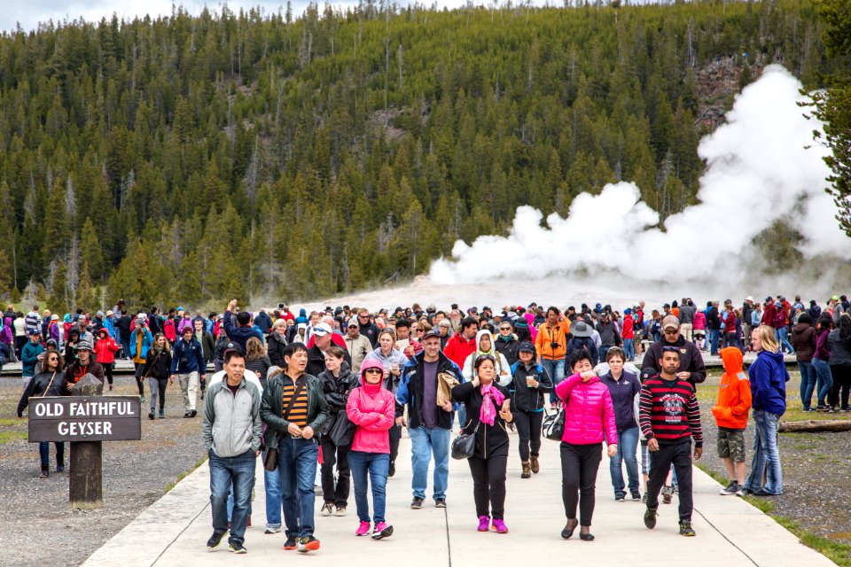People leaving the Old Fatihful viewing area after an eruption.