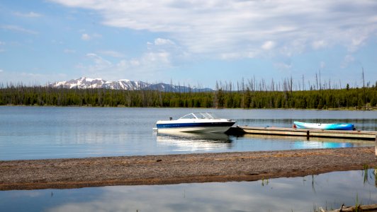 Motorboat and kayak at Wolf Bay dock