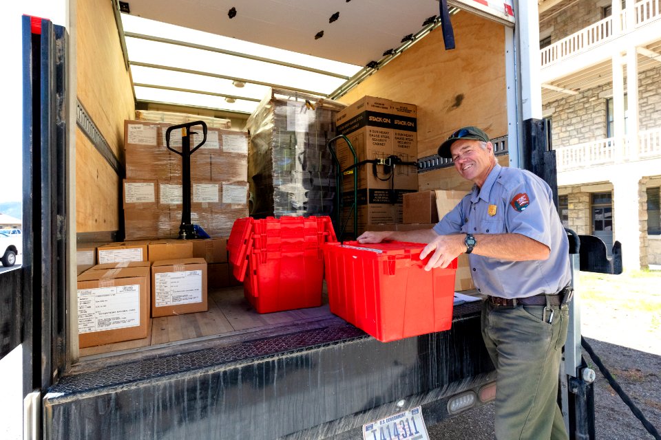 Clark loading the truck for a park courier run