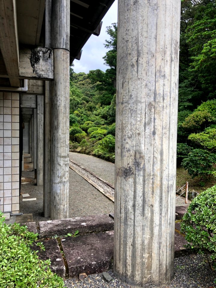 Brutalist Pillars & Raked Garden