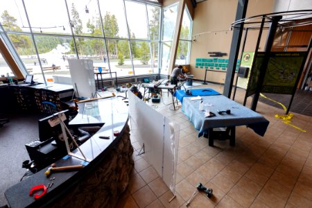 COVID-19 mitigations being installed at the Old Faithful Visitor Education Center