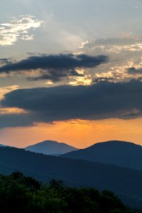 Early Sun Behind the Clouds