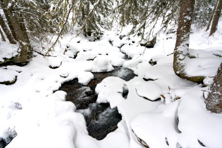 Snowy rocks and cascades of Emigrant Creek