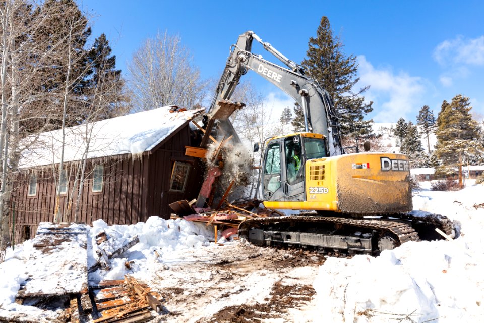Demolishing a building in YACC camp