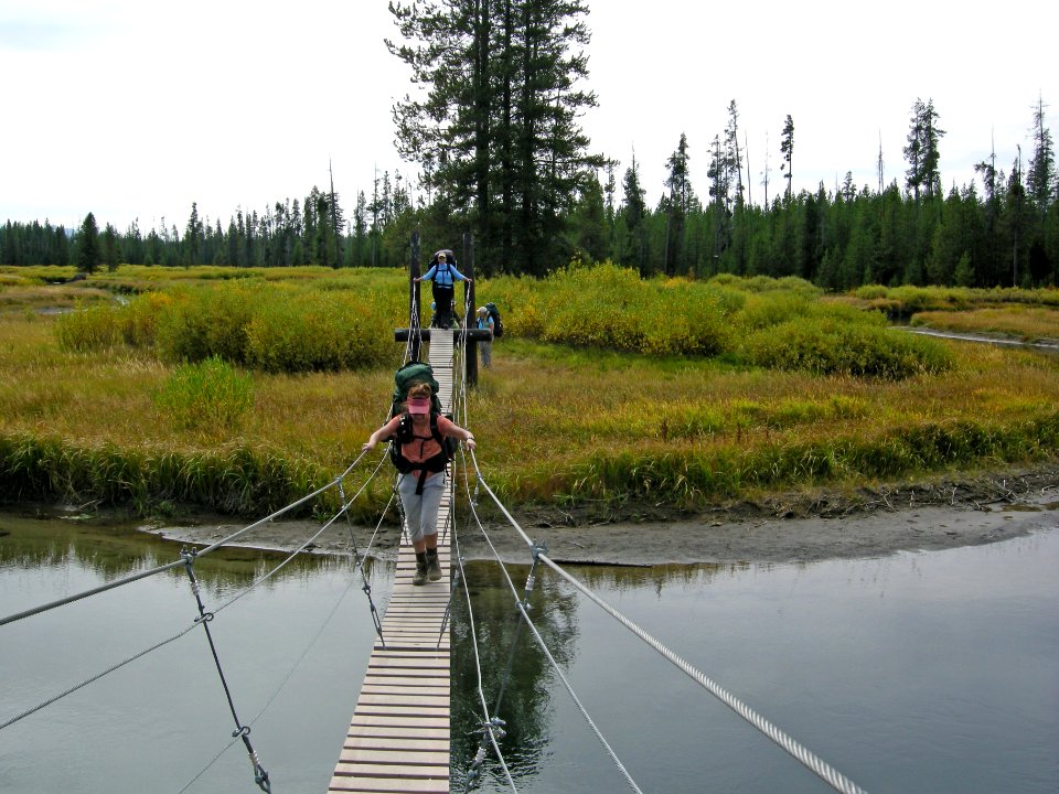 Hikers crossing Boundary Creek