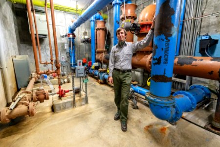 Utility systems operator, Rafal Kos, gives a tour of the water treatment facility