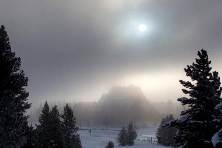 The Old Faithful Inn, shrouded in geyser fog