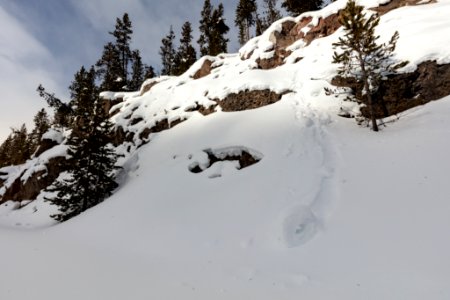 Snow roller along the Firehole River photo