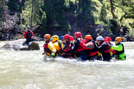 Swiftwater rescue training - rescuing a stranded swimmer using a wedge