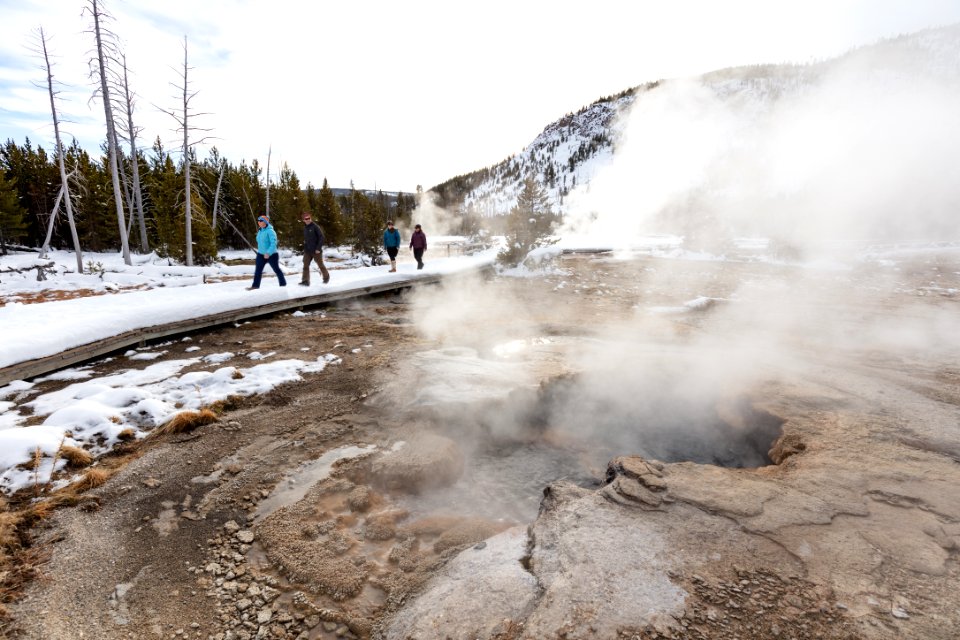 Taking in the winter views of Black Sand Basin from the boardwalks