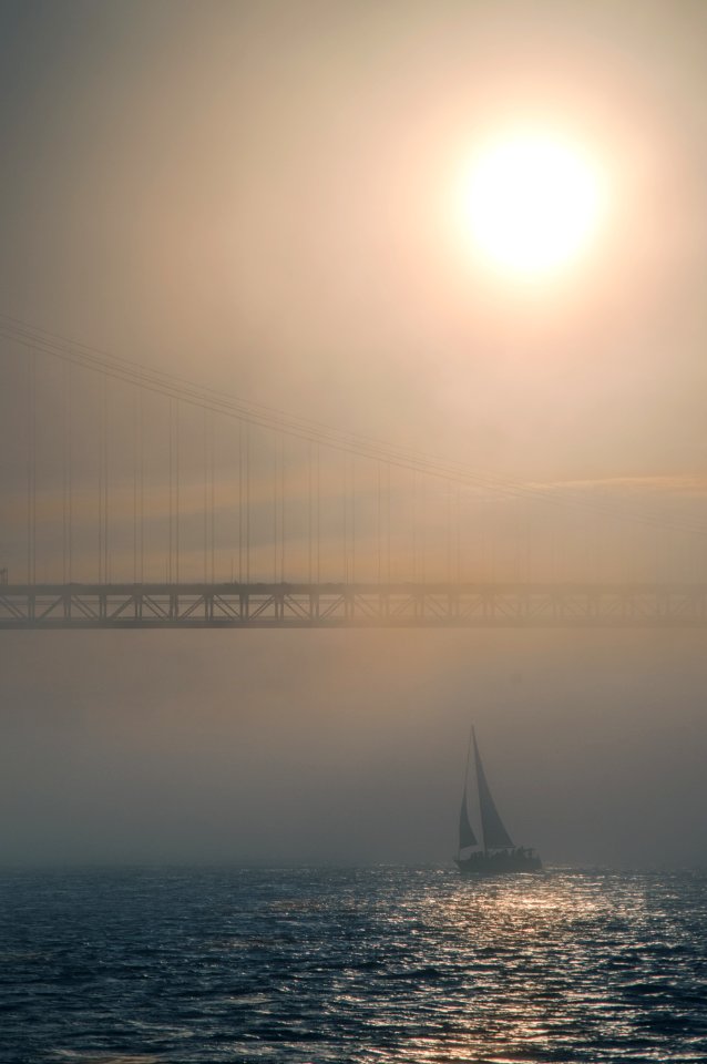 Lisbon, Tagus river, fog, mist, sea,golden hour, light, sun, sunset, bridge, sailboat