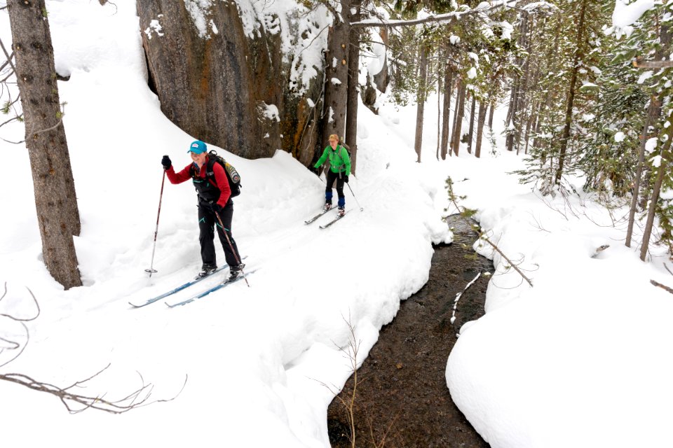 Skiers exiting the canyon along the Spring Creek Trail