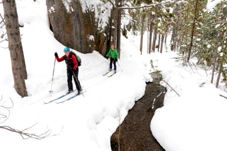 Skiers exiting the canyon along the Spring Creek Trail photo
