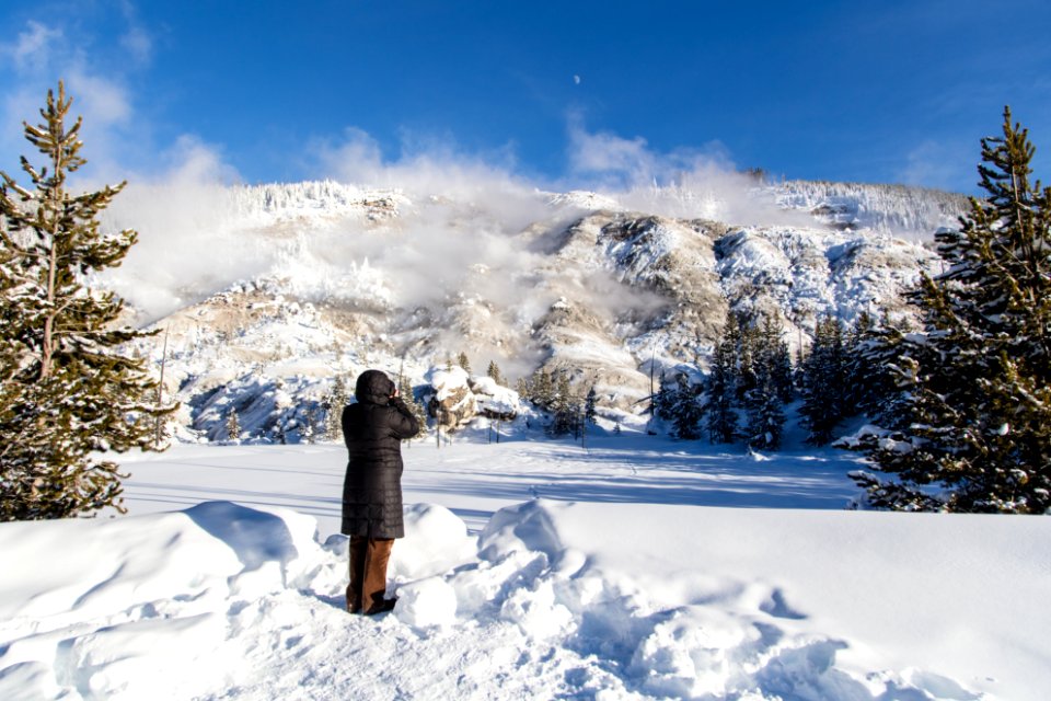 Visitor Photographing Roaring Mountain