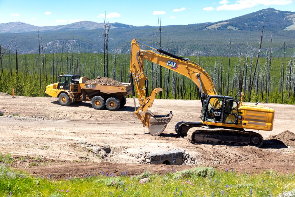 Tower to Chittenden Road Project: Hauling material to backfill around a new culvert on the Chittenden Road intersection