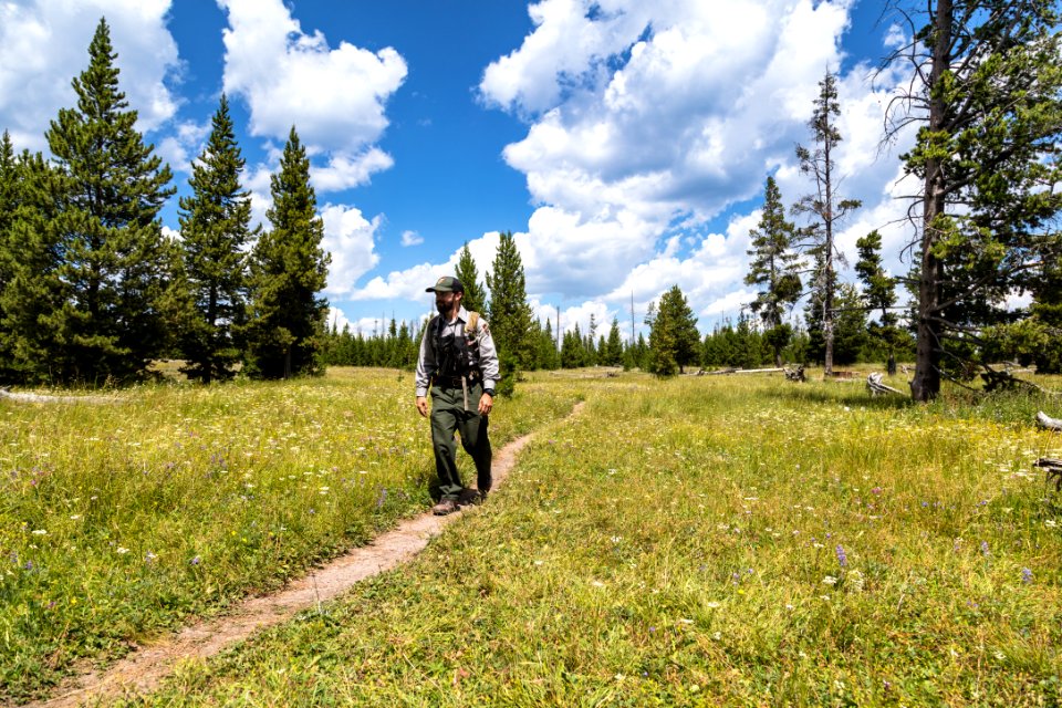 Ranger Giles explores the campsite at Eagle Bay