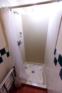 Laurel Dorm before renovation: shower photo