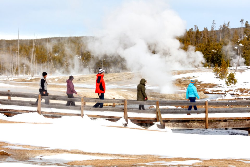Group watches Cliff Geyser erupt from the boardwalk
