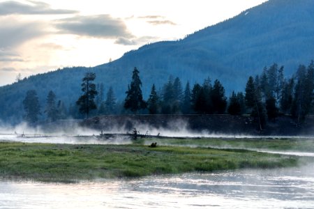 Steam rising from the Madison River photo