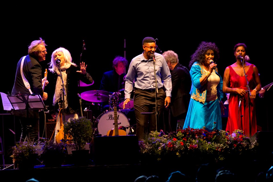 An ensemble of singers including Rodney Crowell, Emmylou Harris, Dorothy Morrison, and Leyla McCalla