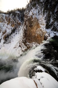 Brink of the Lower Falls after a snow storm photo
