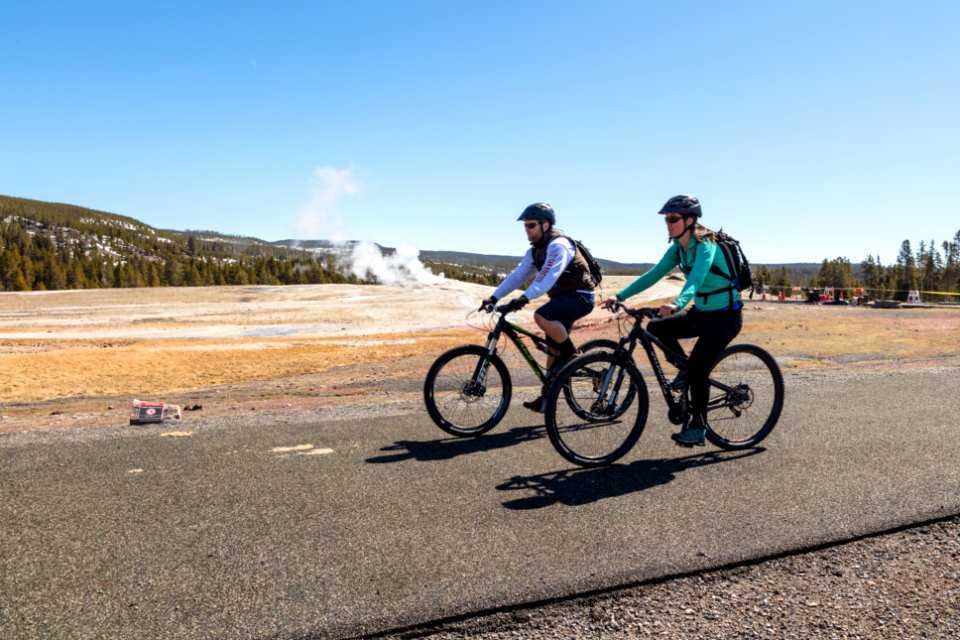 Cyclists at Old Faithful