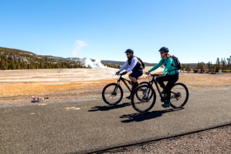 Cyclists at Old Faithful