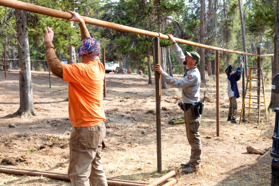 Canyon Corral volunteer project: tacking posts into place (2)