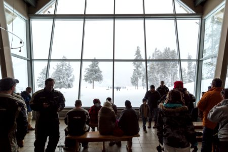 Waiting for Old Faithful to erupt during a snow storm